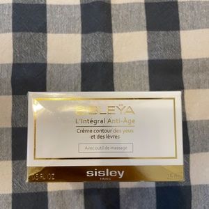 Sisley Paris - Eye and lip contour cream with massage tool - 0.5 fl oz / 15 ml